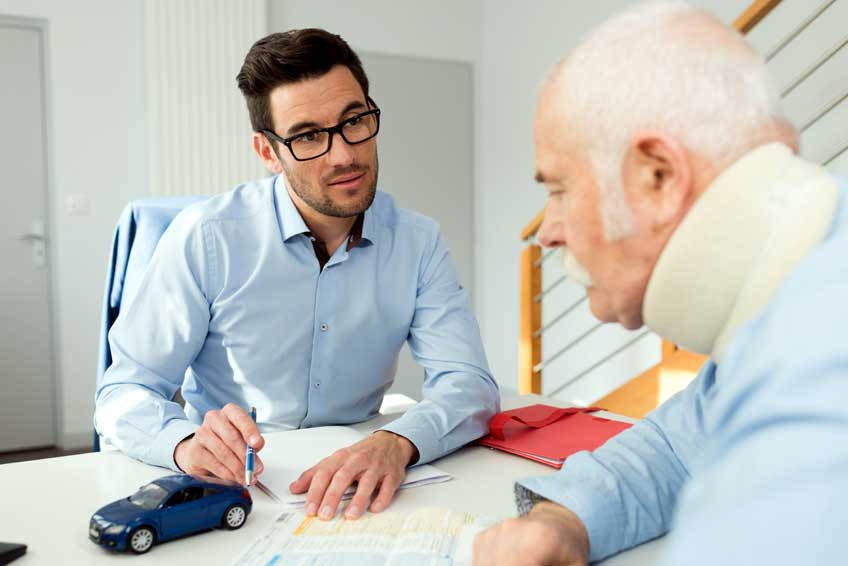 Police officer writing an accident report in Cumming