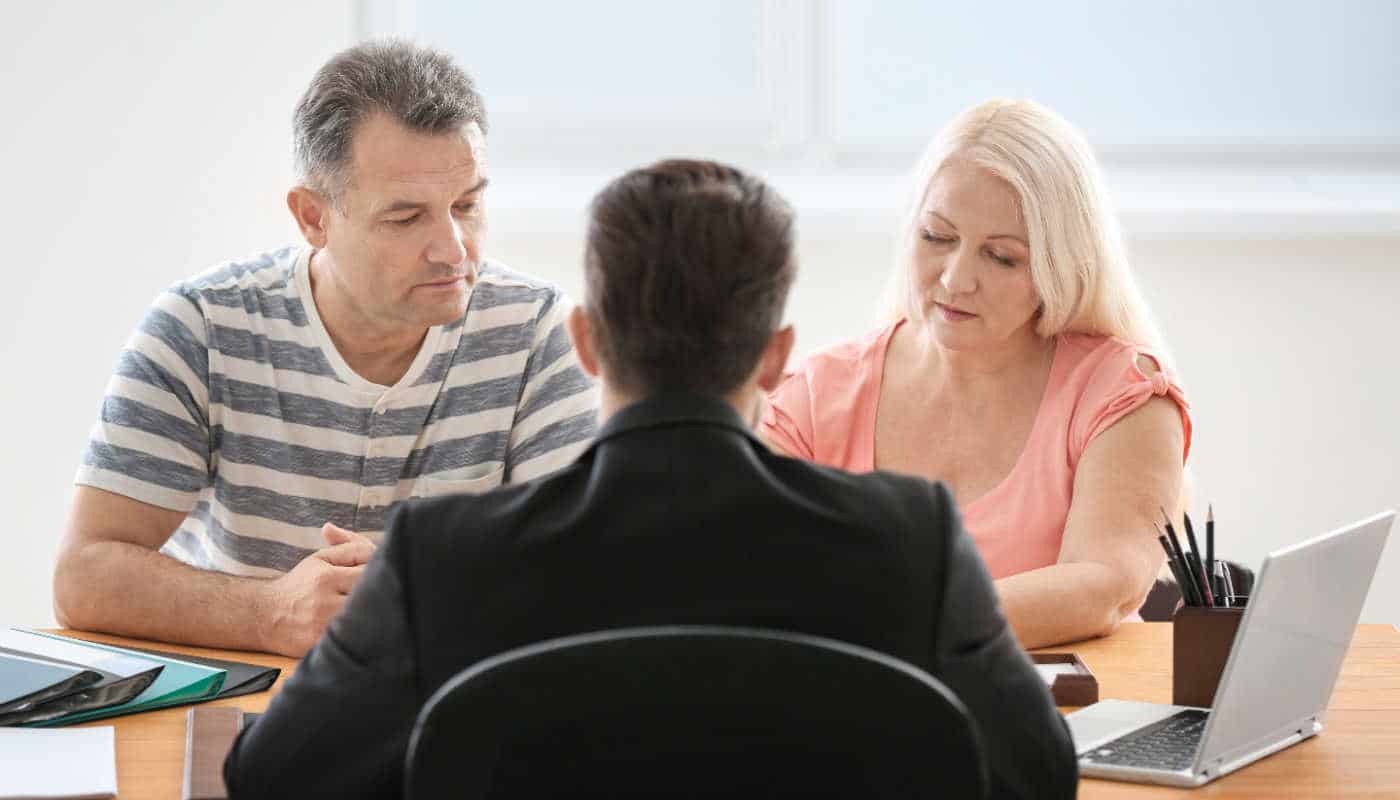 Insurance adjusters evaluating car accident claims in Cumming