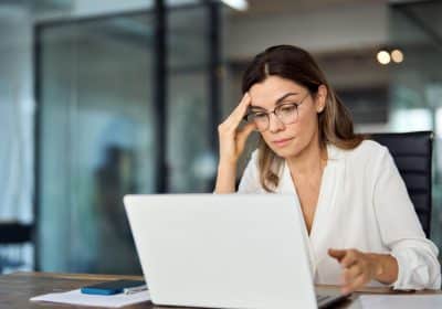 Injured worker reviewing workers' compensation paperwork in Georgia