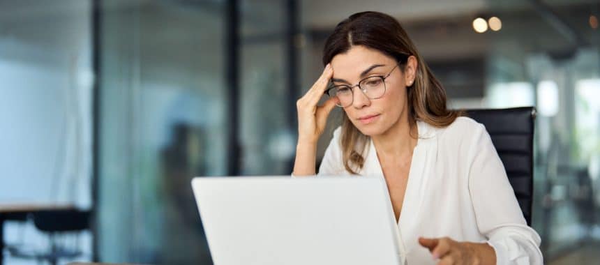 Injured worker reviewing workers' compensation paperwork in Georgia