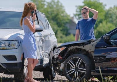Doctor treating injured patient after car accident in Georgia