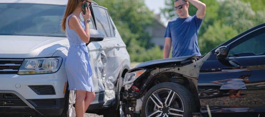 Doctor treating injured patient after car accident in Georgia