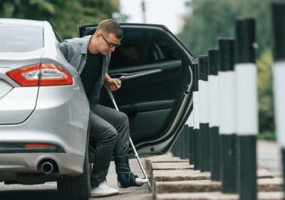 Insurance documents and calculator after car accident in Georgia