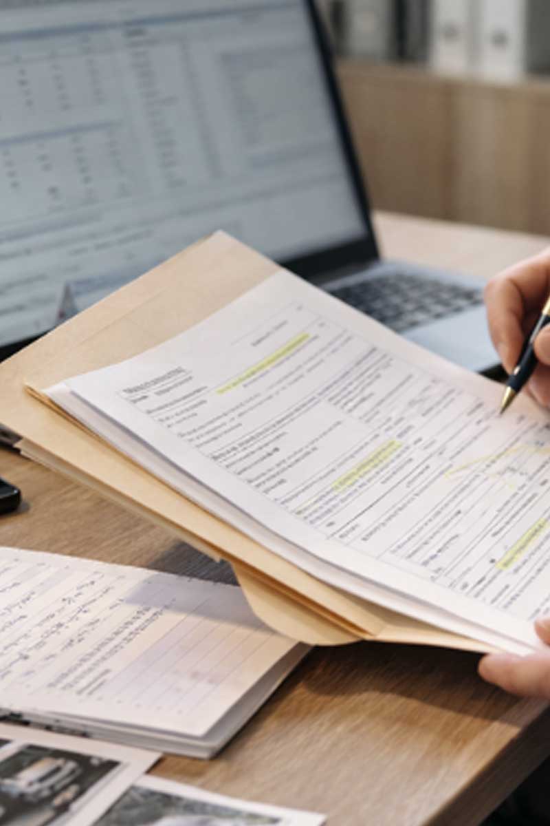 Georgia workers’ compensation claims adjuster reviewing injury documentation