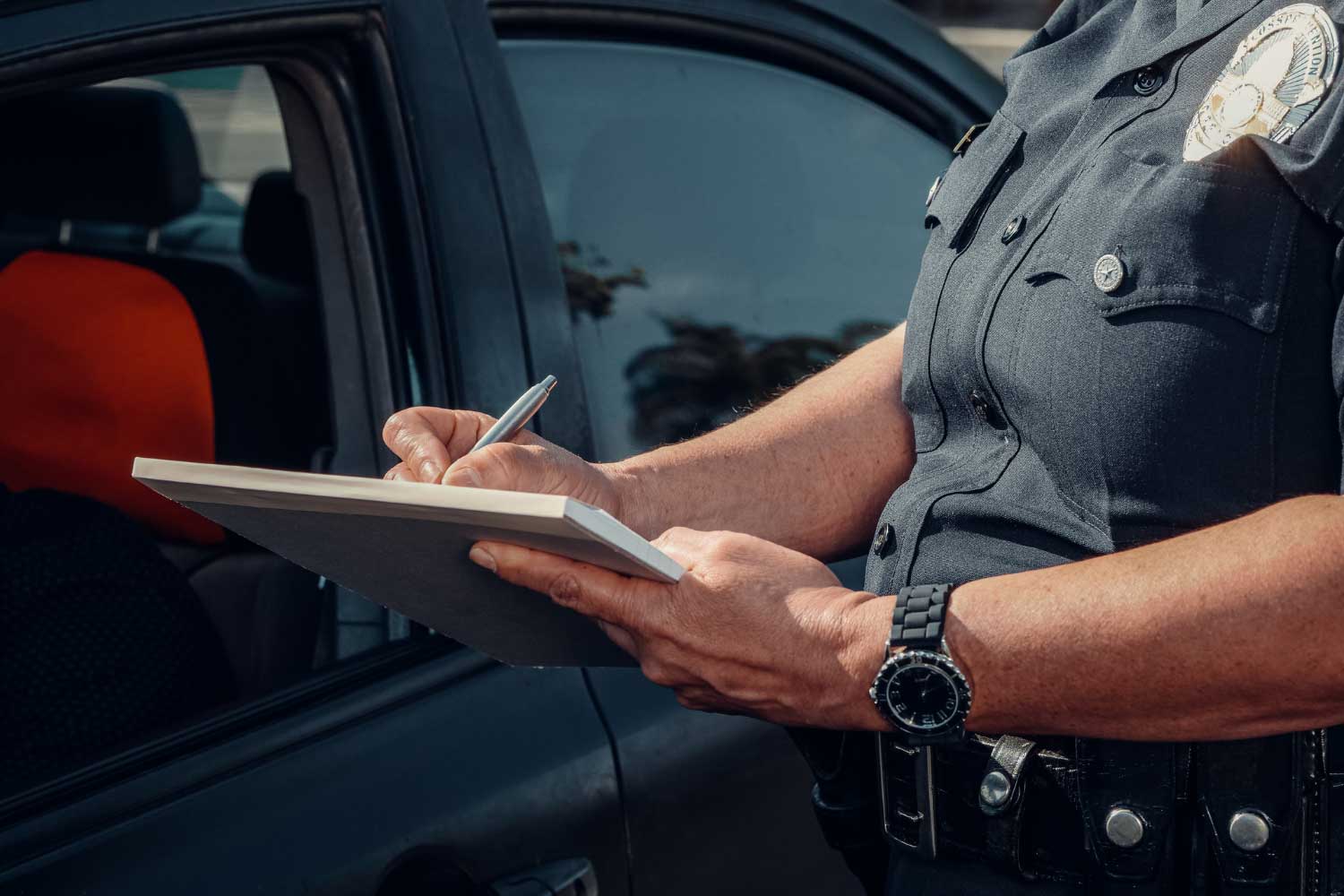 Police officer completing accident report in Dawsonville Georgia