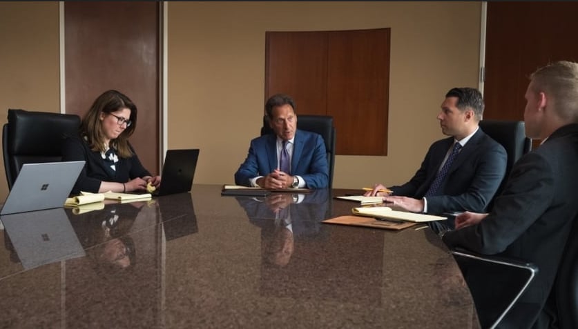 Georgia wrongful death lawyers discussing a case with their legal team