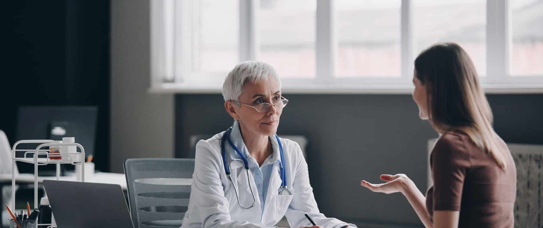 Medical malpractice lawyer reviewing case with patient in Georgia