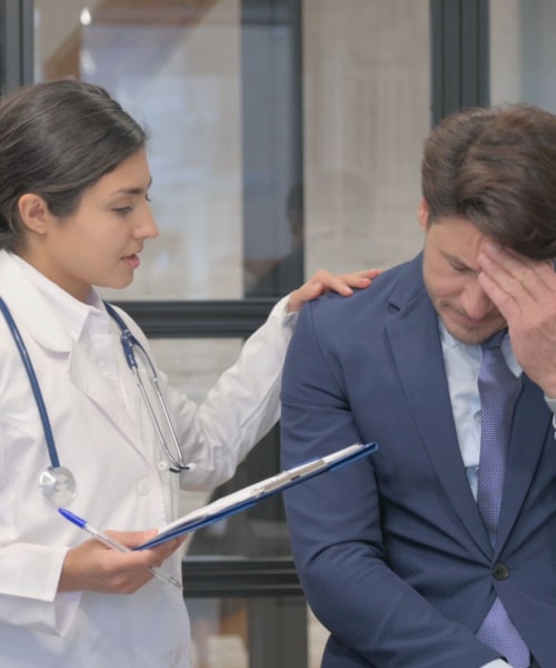 Brain injury attorney consulting with client