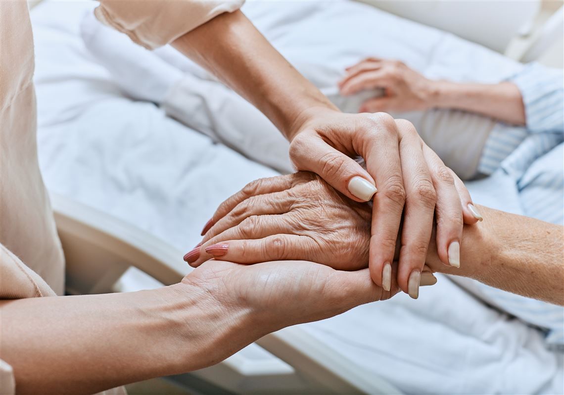 Concerned family member speaking with nursing home abuse lawyer in Georgia